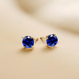 Everyday Elegance 14KT Real Yellow Gold 4 Prong Setting Solitaire Stud Earrings for Men & Women with 7 MM Round Cut Created Blue Sapphire and Screw Back | With Gift Box